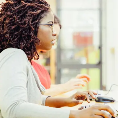 Young Woman At Public Computer